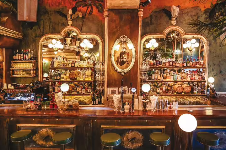 Vintage Athens cocktail bar interior on small group night tour with Greek drinks and local food tasting