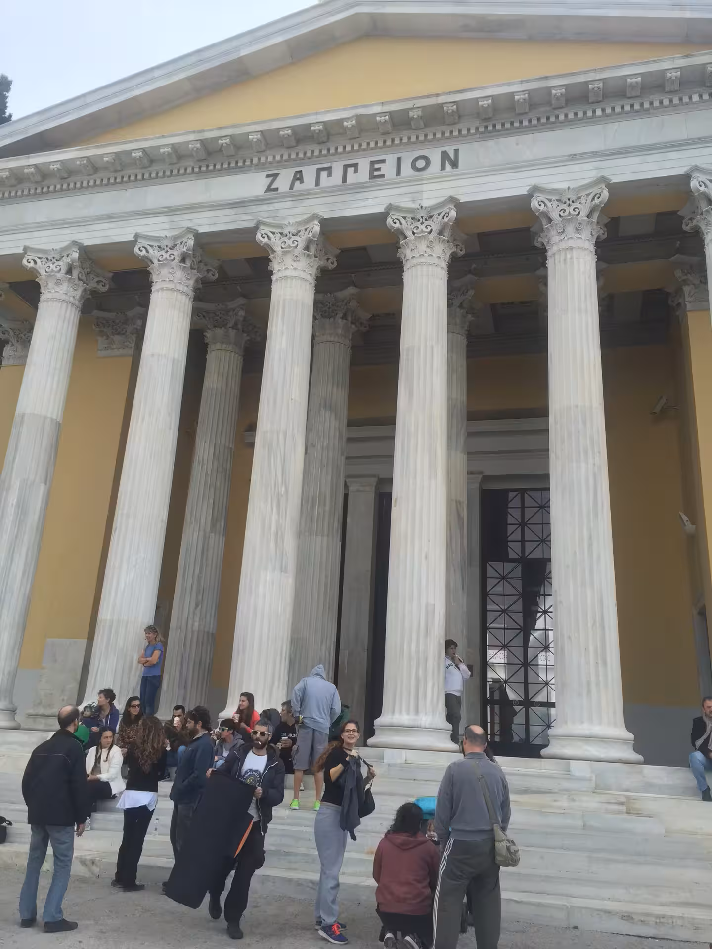 Athens private panorama tour stop at Zappeion Hall, neoclassical columns and visitors in central Athens
