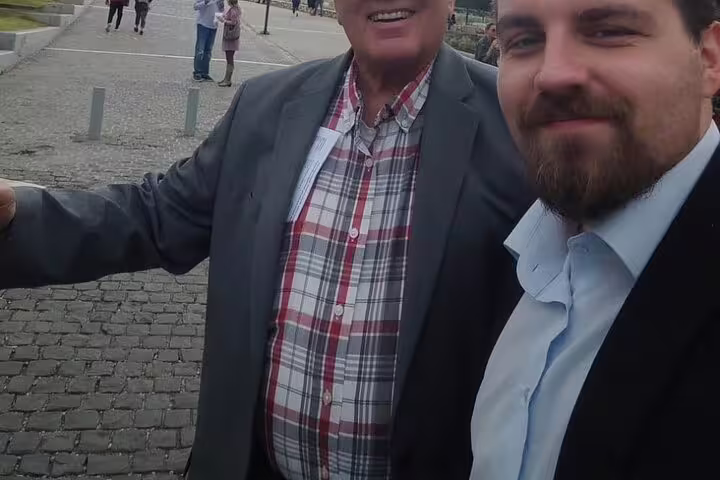 Guests meeting their private guide in Athens during a half day city tour, friendly local host and traveler selfie