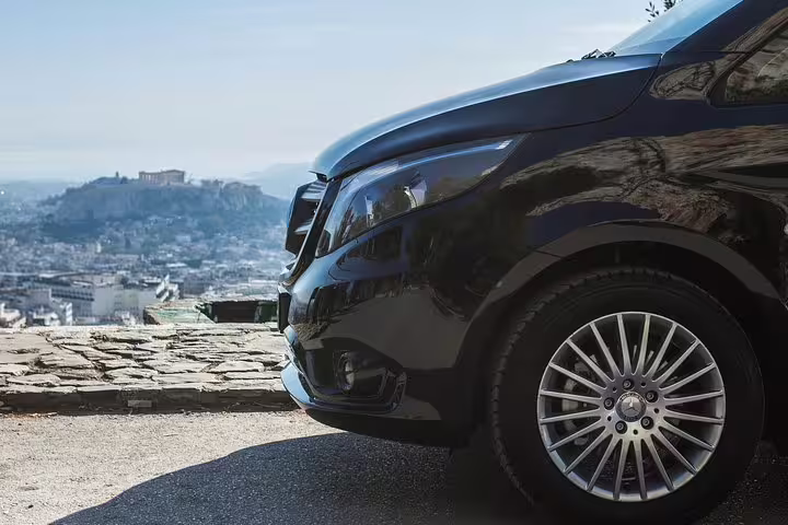 Private tour van overlooking Athens skyline, ideal for Best of Athens half day private sightseeing tour