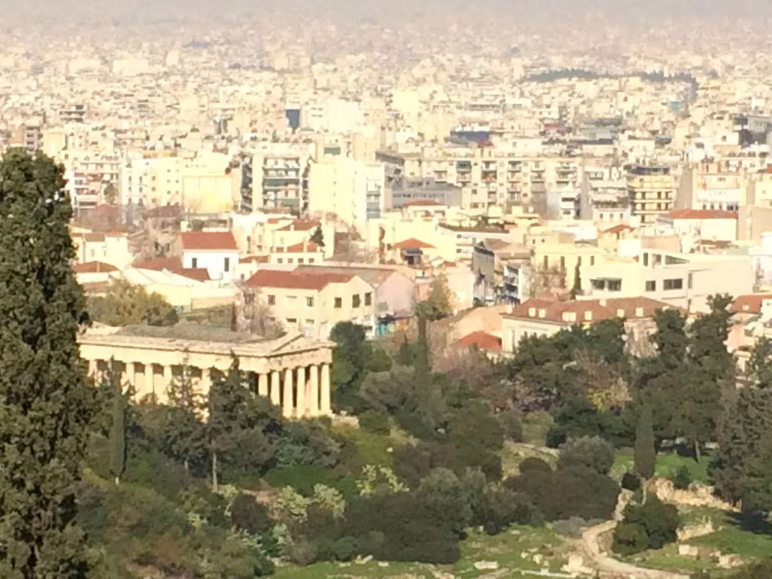 View over Athens with the Temple of Hephaestus in Ancient Agora, highlight of Acropolis-Plaka walk