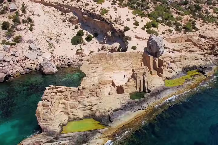 Aerial view of Atlantis Ibiza near San Antonio, carved rock pools and cliffs on the jet ski tour route