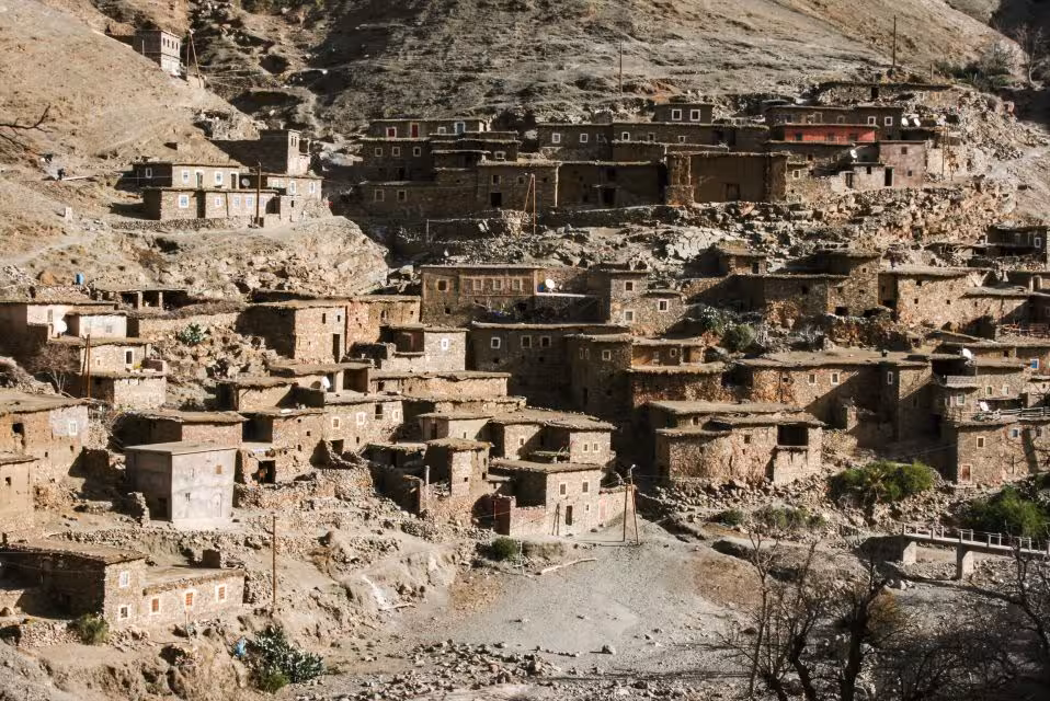Rustic mountain village nestled in the Atlas Mountains, featured on the 4-day Fes to Marrakech desert tour.