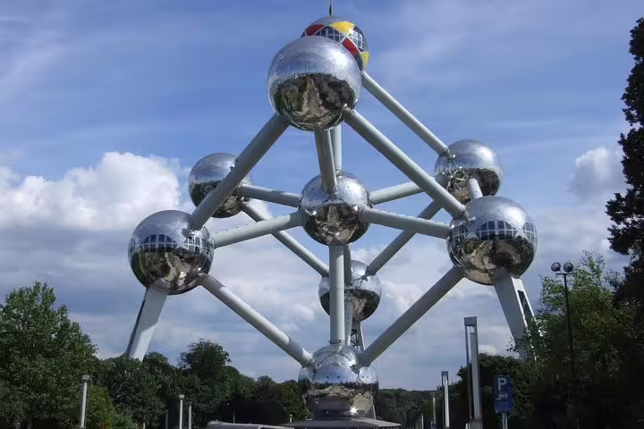 Atomium landmark in Brussels against blue sky, featured on a private 2-hour sightseeing tour with guide