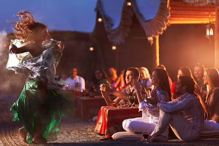 Belly dancer at Bedouin dinner show in Hurghada desert camp after ATV quad biking and camel ride safari