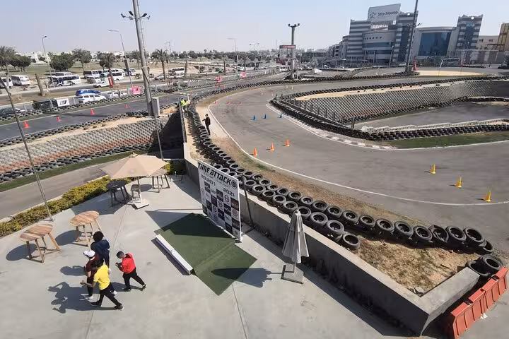 AUTOVROOOM outdoor karting track with tire barriers and sharp turns, ideal for exciting go-kart racing