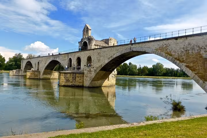Pont Saint-Bénézet medieval stone bridge with arches spanning the Rhône River in Avignon, France