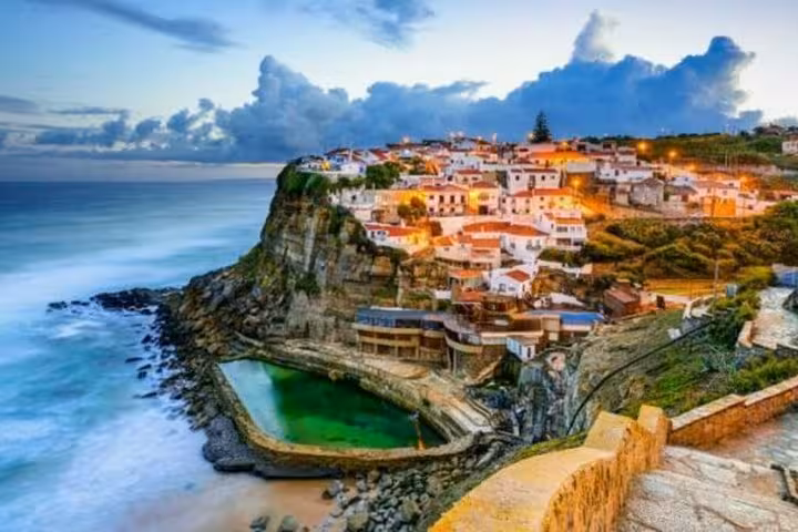Azenhas do Mar cliffside village and ocean pool on Sintra coast, scenic stop on self-drive tour