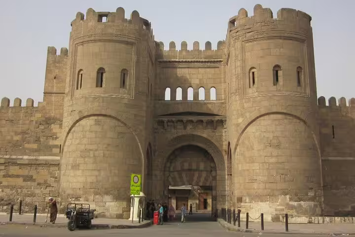 Bab Al-Futuh gate on El-Moez Street in Islamic Cairo, historic fortress entrance on guided city tour