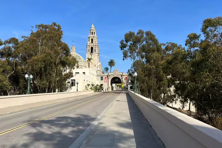 Cabrillo Bridge leading to the historic Spanish Colonial buildings and tower of Balboa Park, San Diego