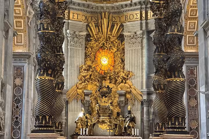 Marvel at the intricate details of the Baldacchino altar inside St. Peter's Basilica during a Vatican private tour.
