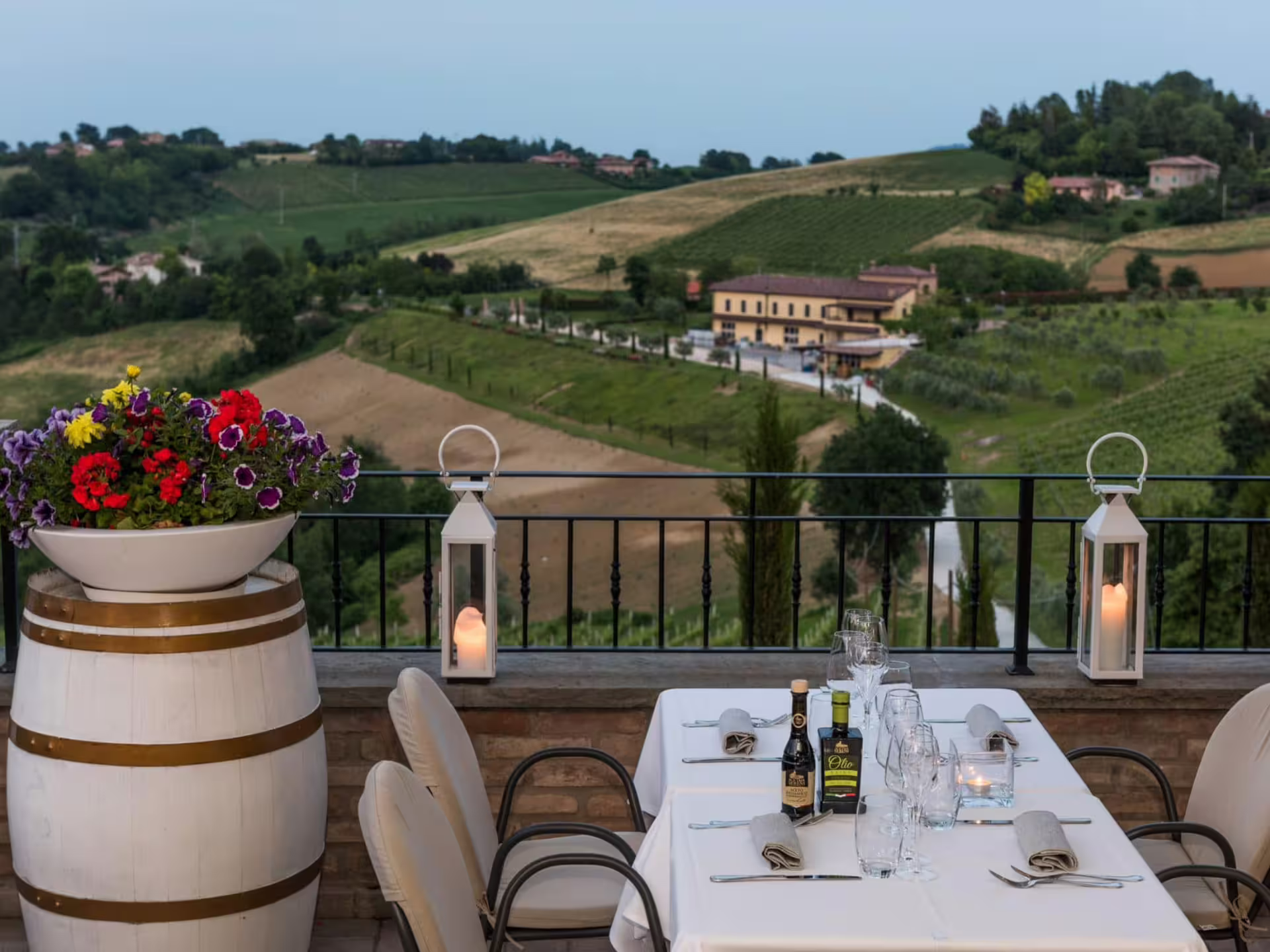 Terrace dining setup overlooking Modena countryside after a balsamic vinegar tasting and acetaia tour experience