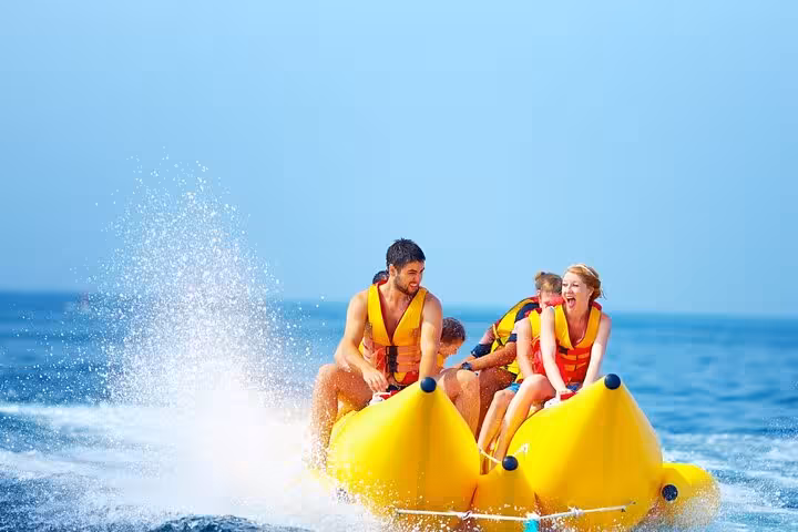 Banana boat ride in Sharm El Sheikh on Mega Safari Waves and Dunes tour, Red Sea water sports fun
