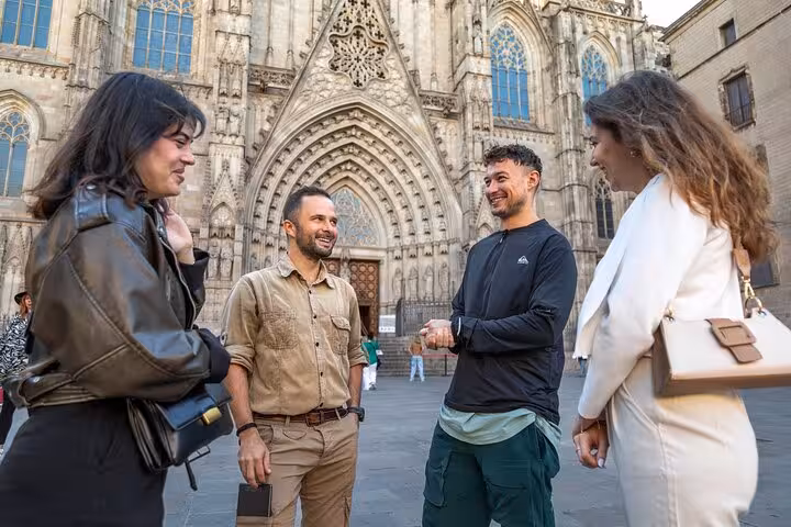 Travelers admire Barcelona Cathedral on a Gothic Quarter walking tour in Old Town Barcelona