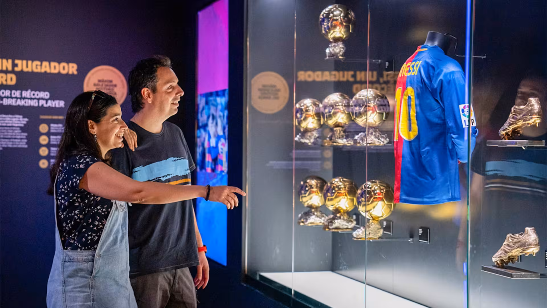 Visitors admire Messi shirt and Ballon d’Or display at FC Barcelona museum on an all-inclusive tour