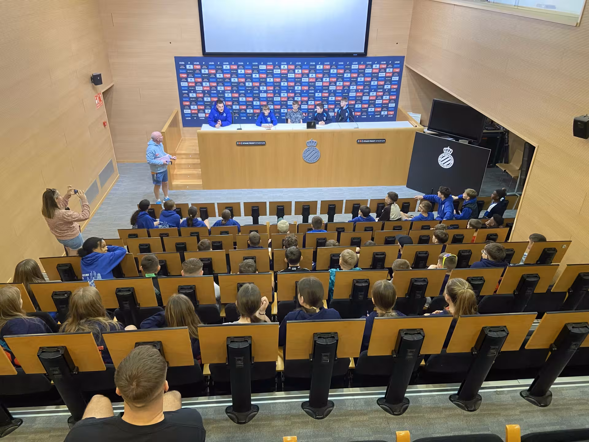 Press room experience at RCDE Stage Front Stadium on Barcelona all-inclusive football tour with guide talk