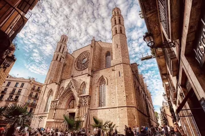 Gothic architecture of Santa Maria del Mar under a vibrant sky on the Private Barcelona Walking Tour.