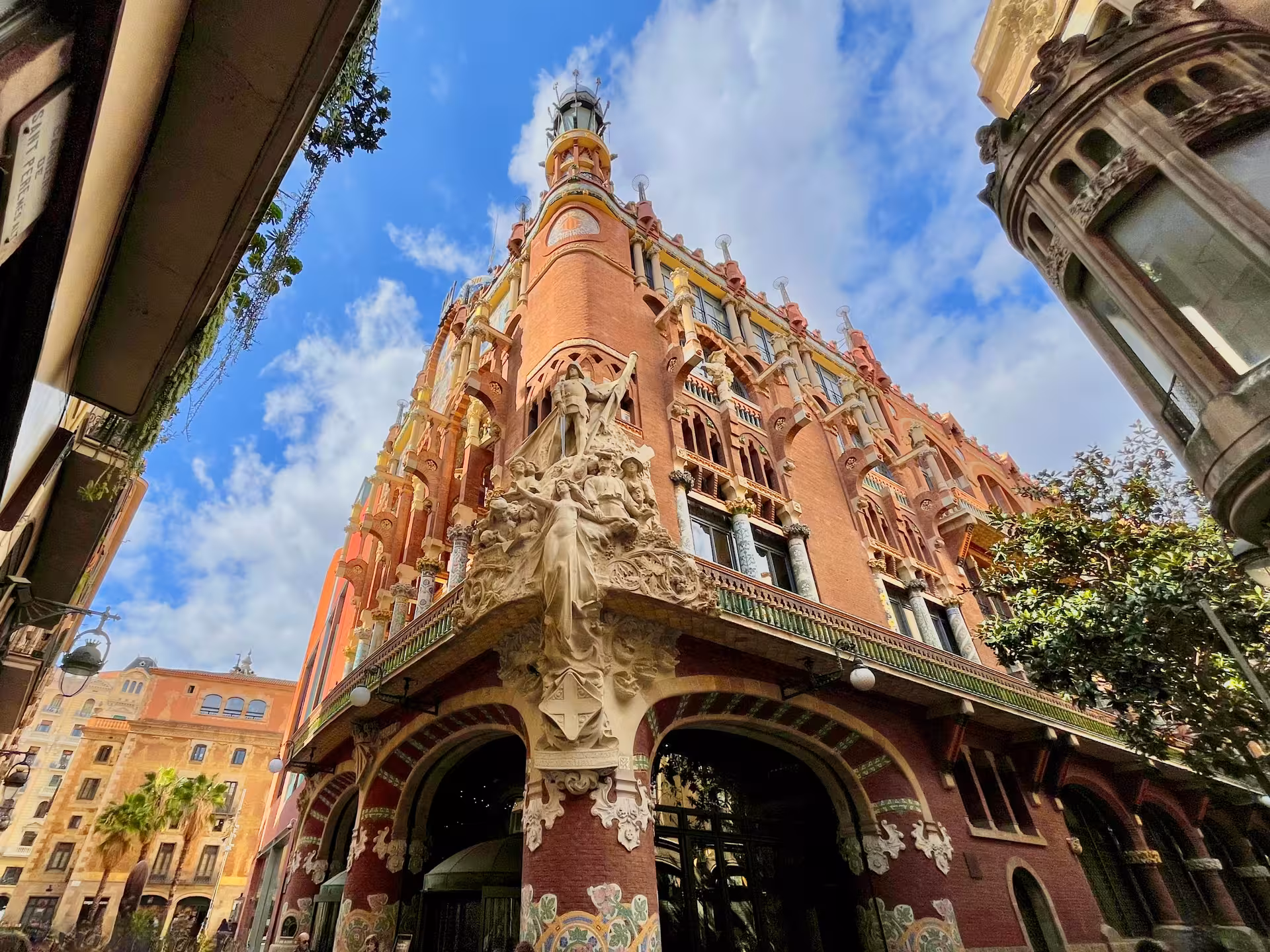 Guided Barcelona modernist stop at Palau de la Música Catalana facade on Encantos Locales tour