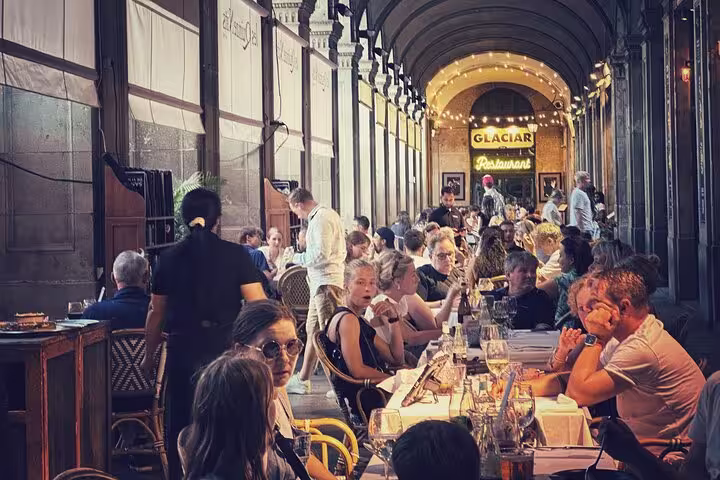 Bustling restaurant in historic old town, offering a lively atmosphere for the 1.5h Private Old Town Tour guests.