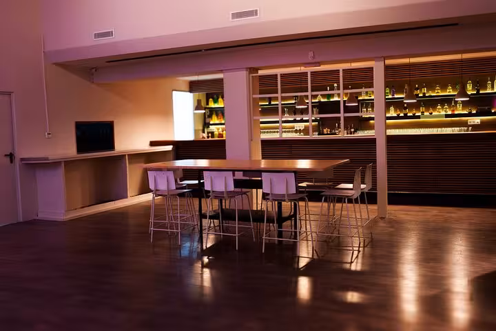 Chic and modern kitchen space set up for a Barcelona paella and sangria cooking class experience.