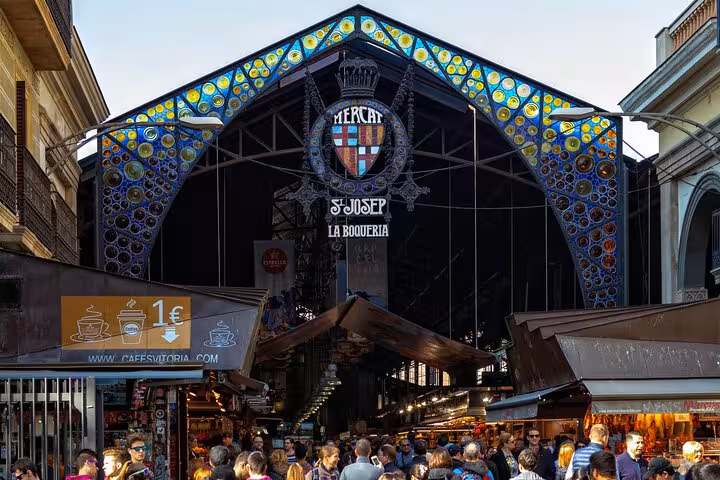 Discover the iconic entrance of Mercat de Sant Josep de la Boqueria on your private Barcelona tour by car.