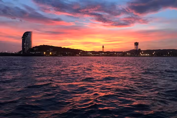 Barcelona sunset sail with W Hotel skyline, private sailing cruise with live saxophone and open bar on board