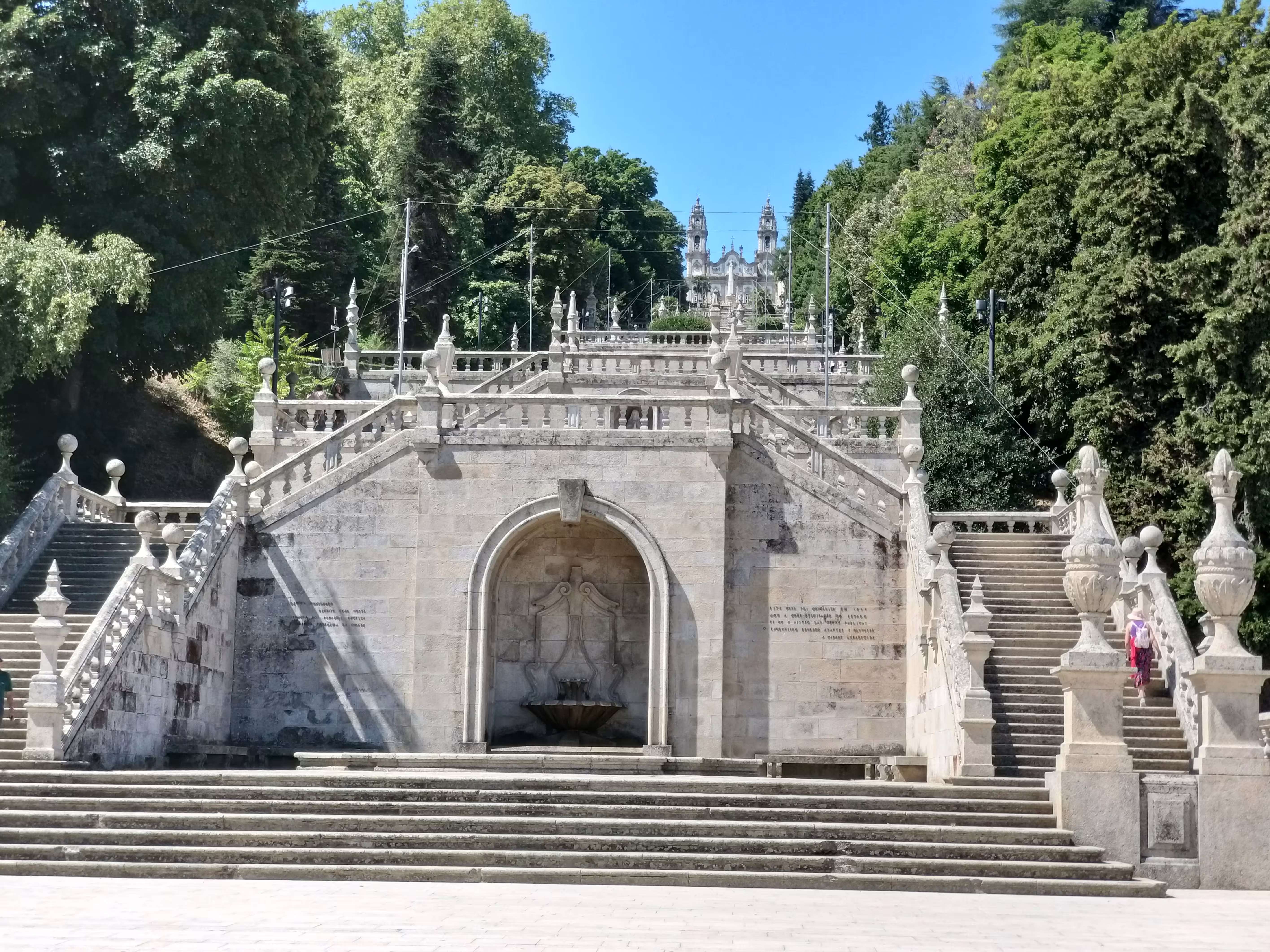 Baroque staircase at Bom Jesus do Monte, surrounded by lush greenery, perfect stop on a private car transfer from Porto to Peso da Régua.