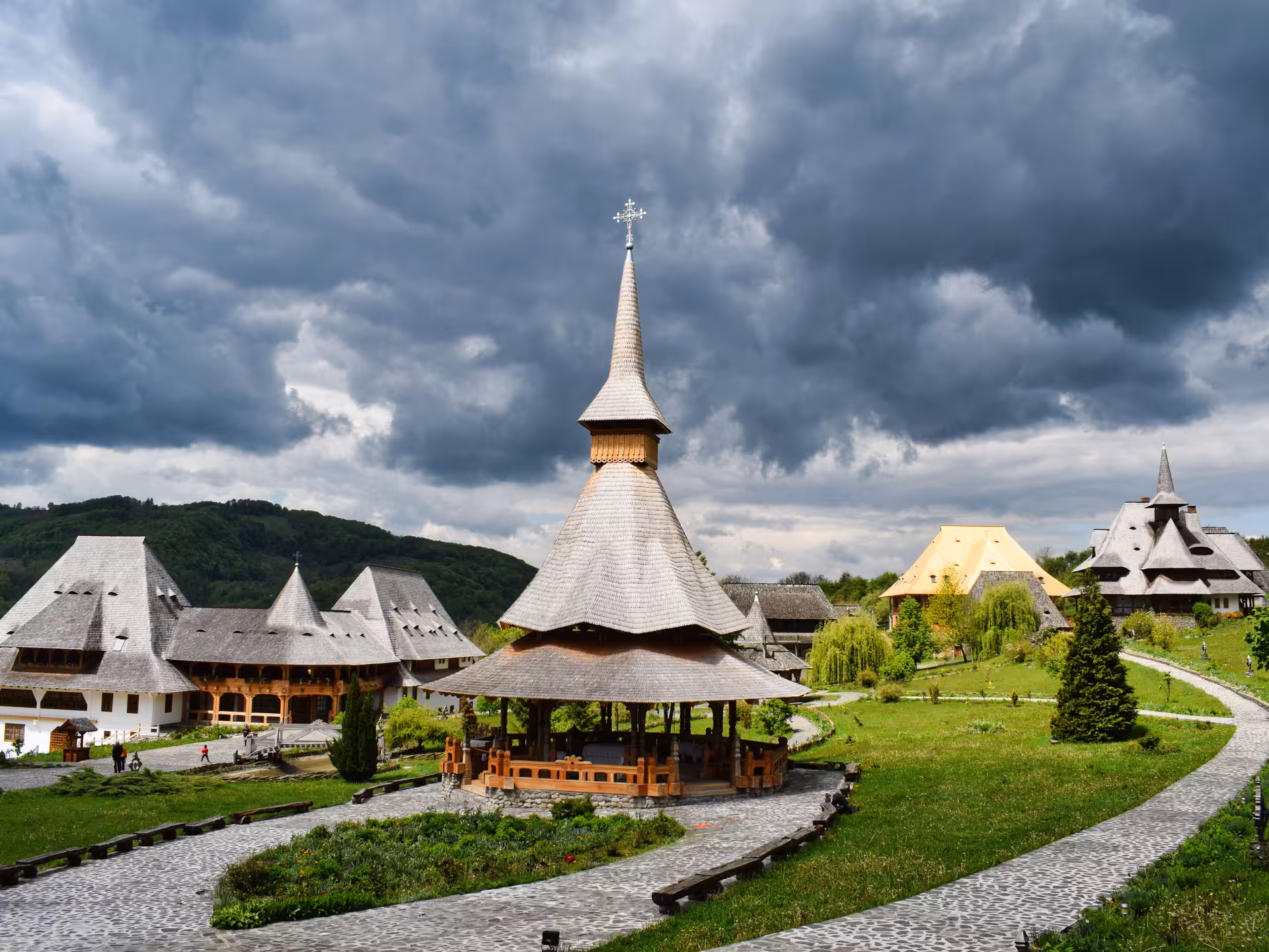 Barsana Monastery complex in Maramures Romania featuring traditional wooden spire architecture on a guided UNESCO tour