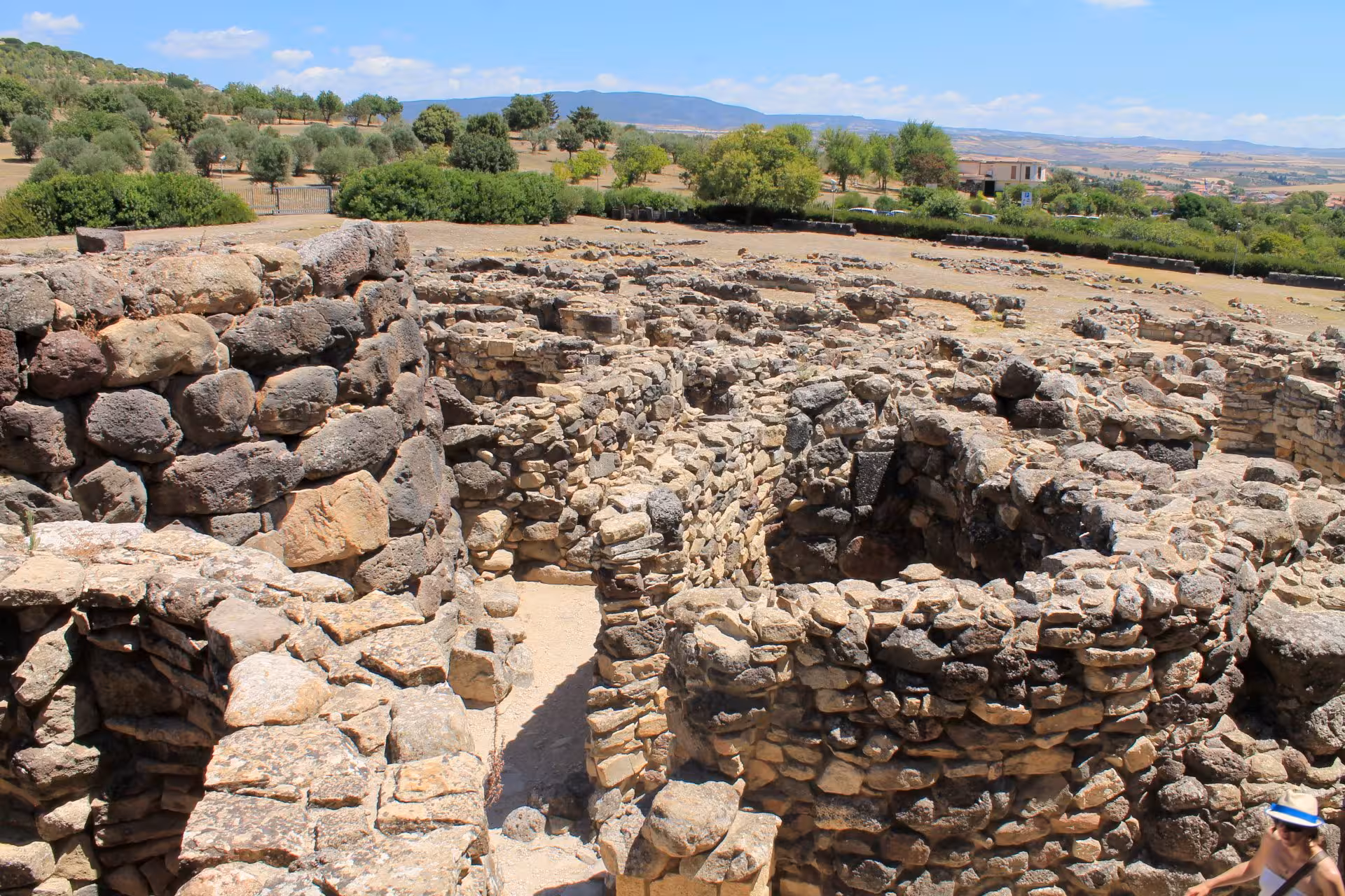 Discover the intricate stone structures of Barumini's UNESCO site, set against the scenic Sardinian countryside.