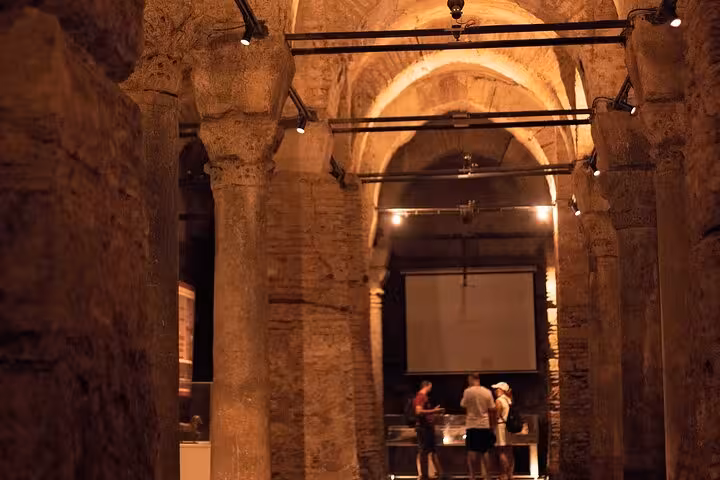 Inside Basilica Cistern in Istanbul with stone columns and arches, explored on a private guided 3-day tour