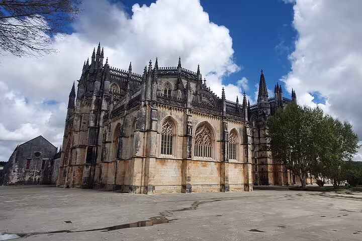 Explore the stunning Gothic architecture of Batalha Monastery on the Fátima, Nazaré, Batalha, and Óbidos tour from Lisbon.