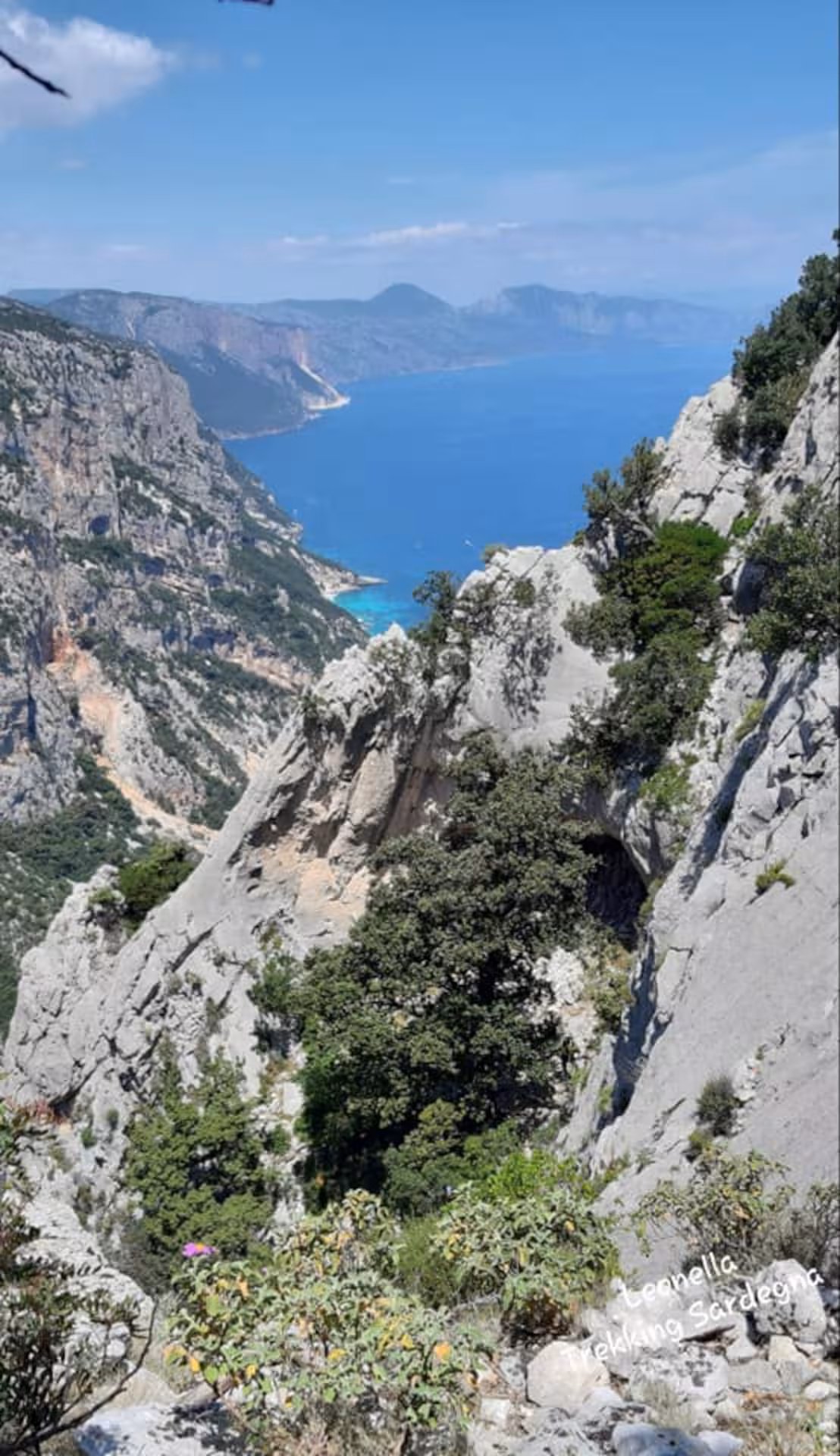 Majestic cliffs and turquoise waters on the Cala Goloritzè trekking route in Baunei, Sardinia.