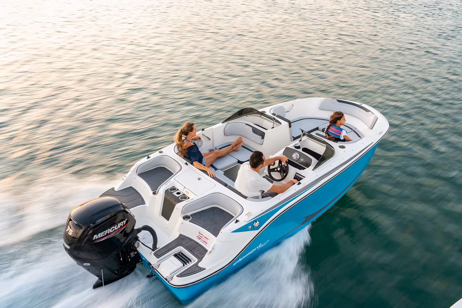 Bayliner M17 speedboat cruising on calm sea for a 2-hour cave and snorkelling experience with small group