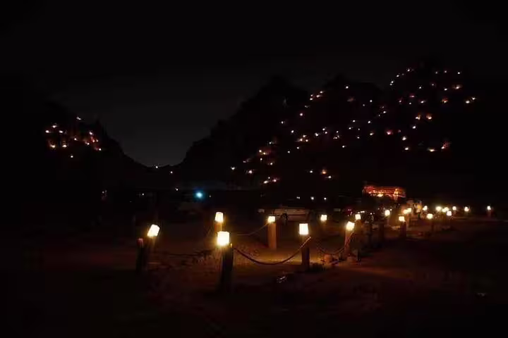 Bedouin desert camp lights in Sinai near Sharm El Sheikh, dinner with show after ATV quad bike and stargazing
