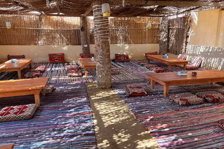 Bedouin-style desert camp seating in Fayoum Oasis, perfect stop on Cairo Magic Lake and dunes tour