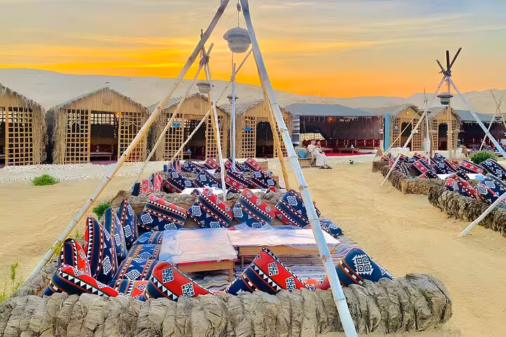 Bedouin desert camp seating at sunset for VIP Arabian Night dinner and show in Giza with free photographer