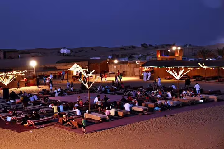 Evening Bedouin camp dinner show seating in Sharm El Sheikh desert safari after ATV quad biking and camel ride