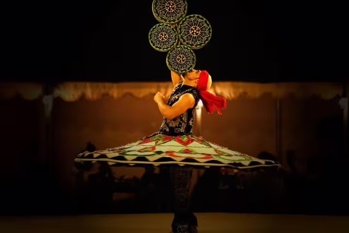 Tanoura dancer spinning at Bedouin show during Hurghada desert safari with dinner, ATV quad bike and camel ride