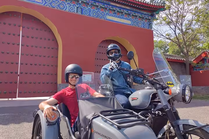 Discover Beijing's ancient architecture on a guided sidecar motorcycle tour, offering a blend of history and thrill.