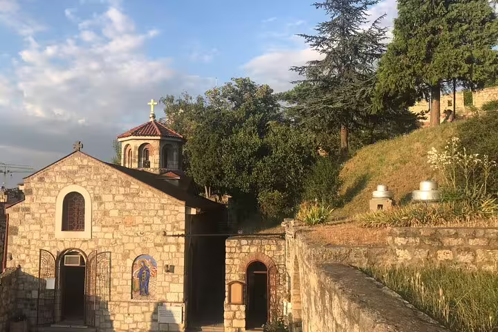 Small stone Orthodox church in Belgrade at sunset, a hidden gem stop on Your Own Belgrade private tour