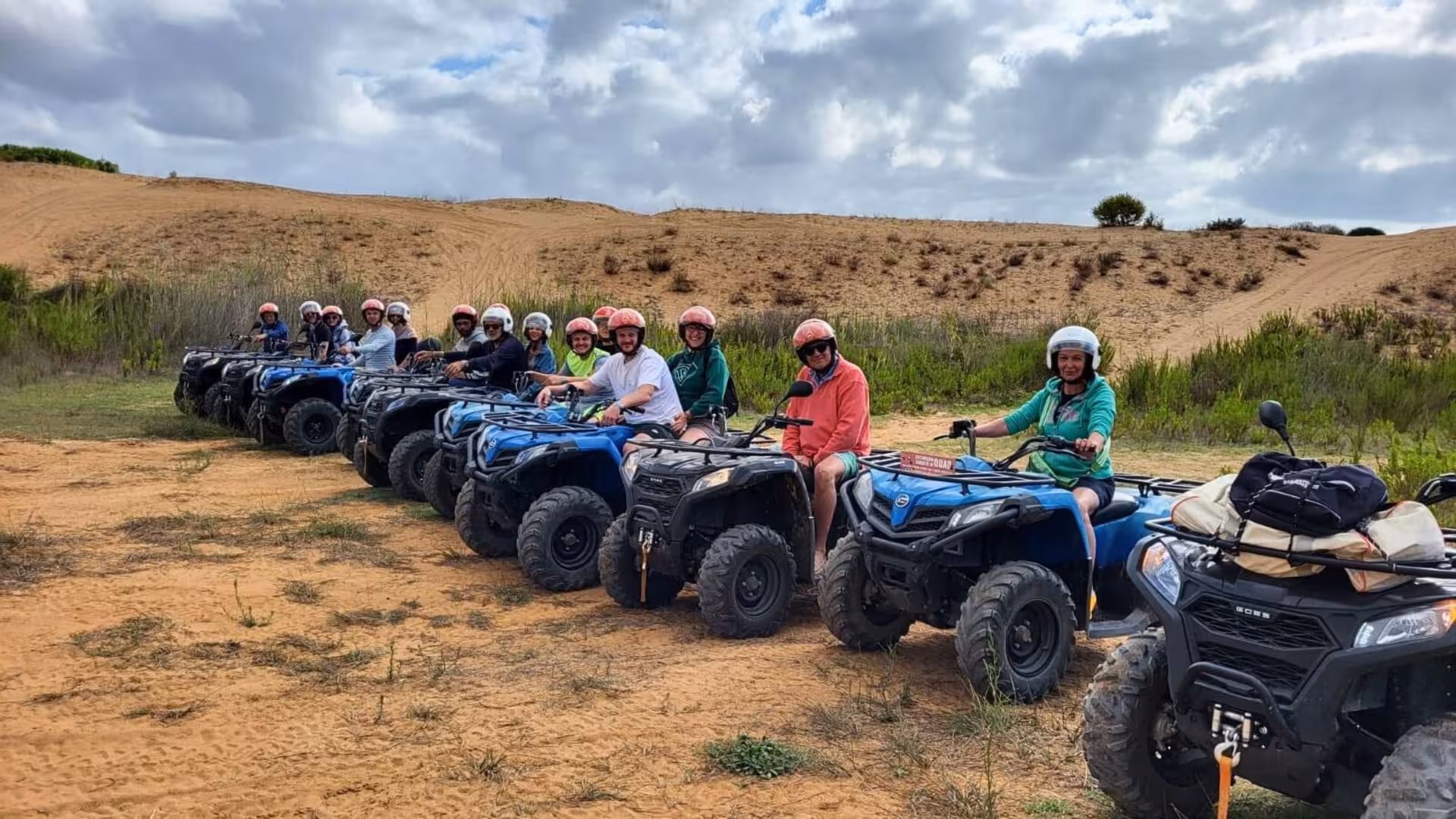 Riders prepare for an exhilarating experience on the Belice Valley 3-hour ATV tour in a picturesque setting.