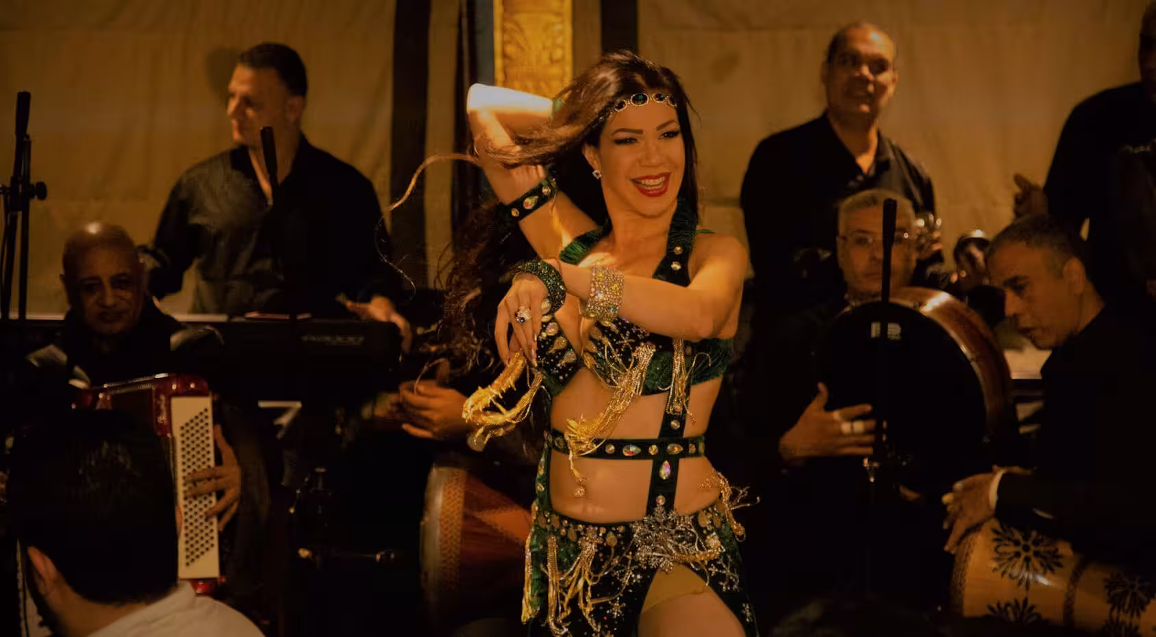 Belly dancer show with live band during a Nile dinner cruise in Cairo on a private evening tour