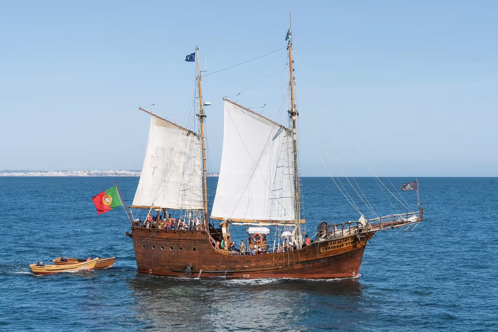 Sail the picturesque Algarve coast on a classic wooden ship, combining tradition and scenic beauty on our morning Benagil cruise.