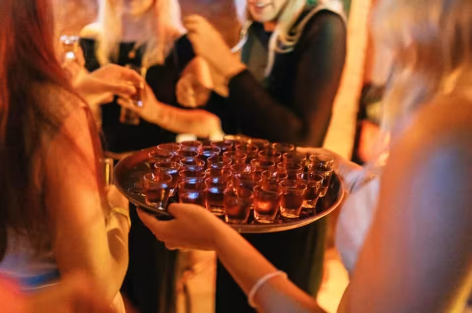 Tray of welcome shots served to guests on Berlin Ludwig’s city center pub crawl before VIP club entry