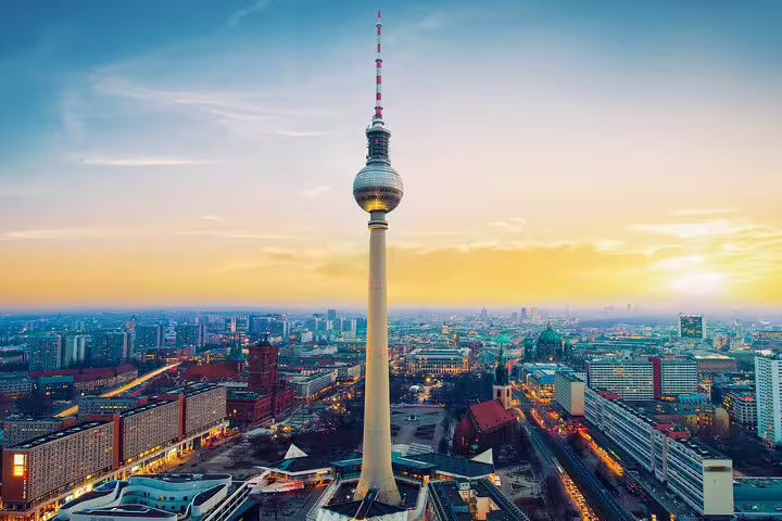 Aerial panoramic view of Berlin city skyline at sunset with the iconic Fernsehturm TV Tower