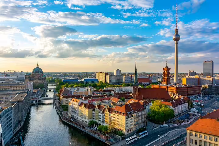 Aerial view of Berlin cityscape with Fernsehturm TV Tower, Spree River, and red brick Rotes Rathaus