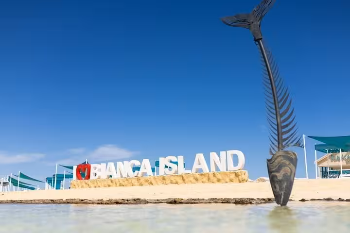 Bianca Island sign on sandy beach near Hurghada, Red Sea day trip with transfer and lunch included