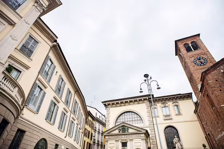 Biblioteca Ambrosiana facade and bell tower in Milan's historic Piazza della Biblioteca