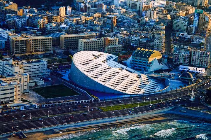 Aerial view of Bibliotheca Alexandrina on the Mediterranean, stop on a private Alexandria day tour from Cairo