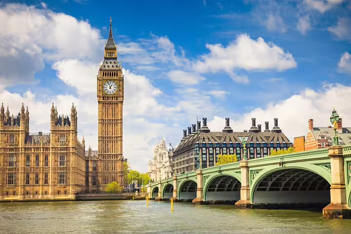 Big Ben clock tower and Houses of Parliament beside the River Thames with Westminster Bridge, London